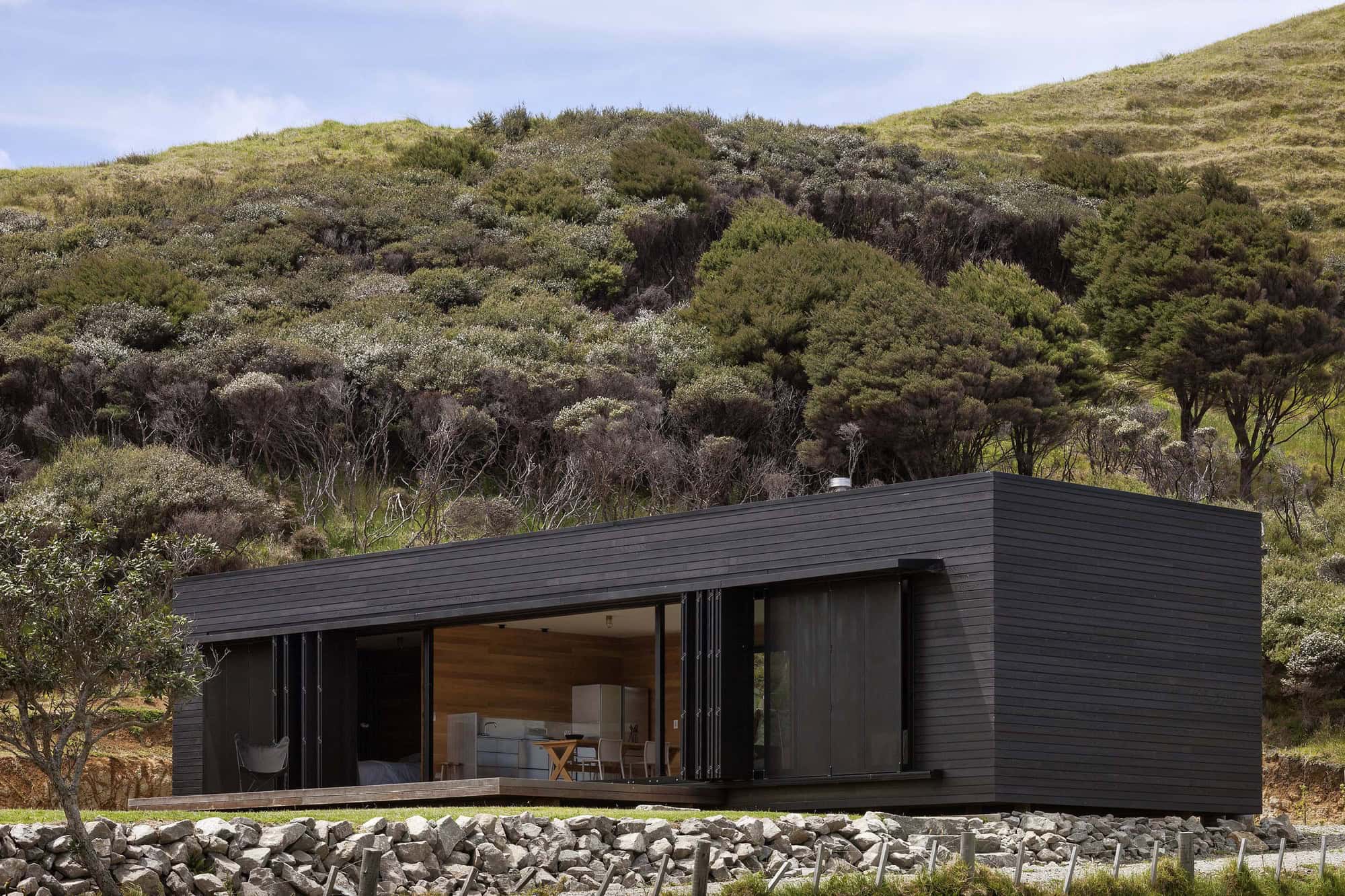 Storm Cottage by Fearon Hay Architects in Great Barrier Island, New Zealand