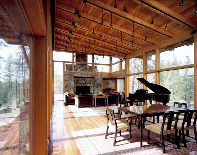 Ridge House Located in the Middle of Conifer Forest