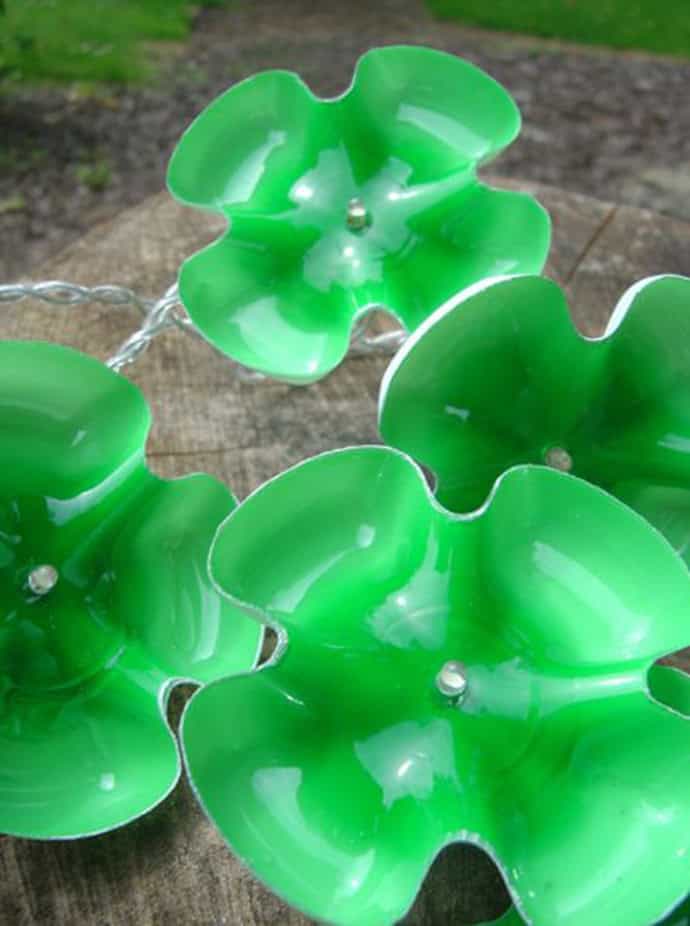 1. Create Charming Flower Decorations from Plastic Bottle Cutouts 1. Create Charming Flower Decorations from Plastic Bottle Cutouts