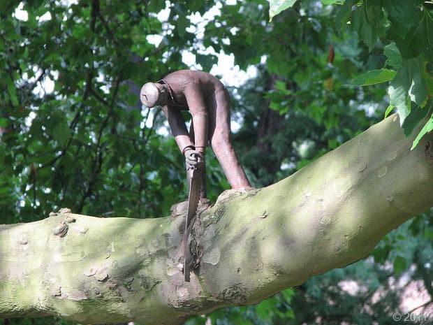 17. Statue of a Man Sawing a Branch, Amsterdam, Netherlands 17. Statue of a Man Sawing a Branch, Amsterdam, Netherlands