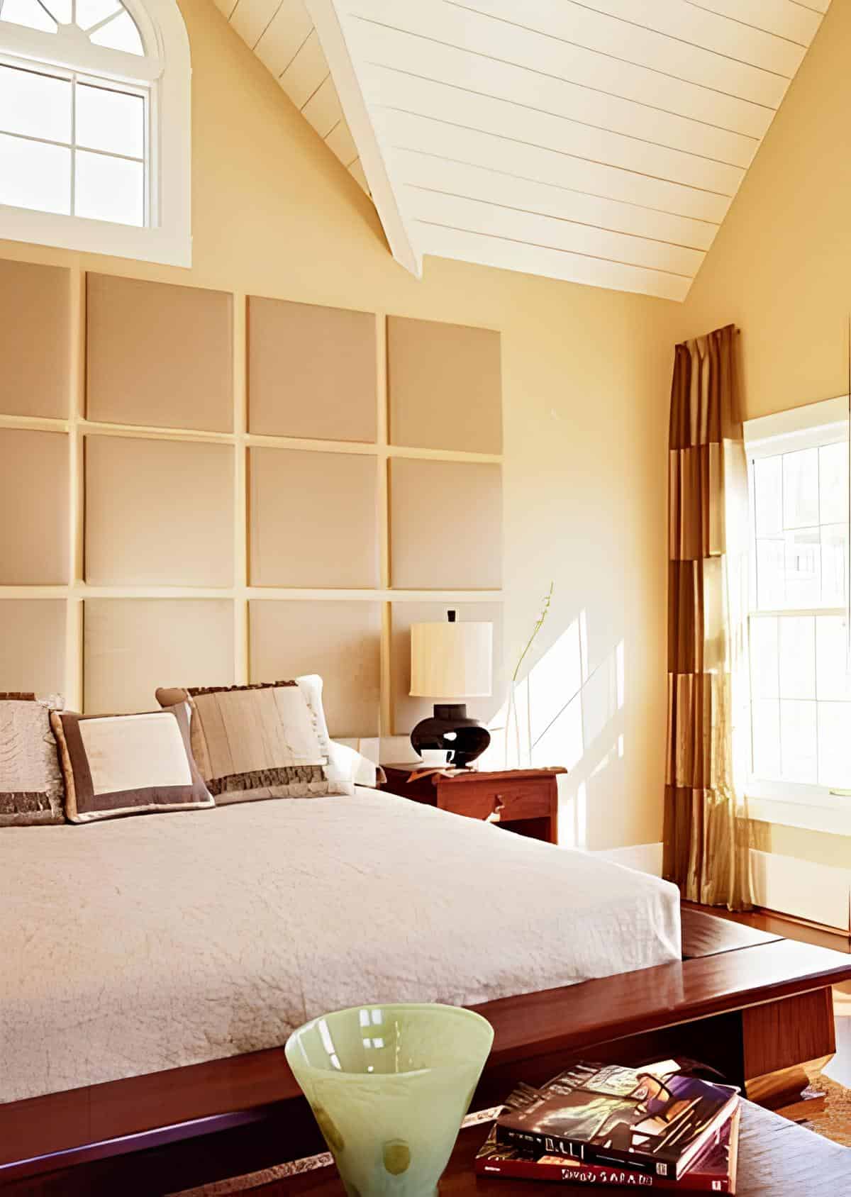 Beach-inspired bedroom decor with painted paddles as a headboard