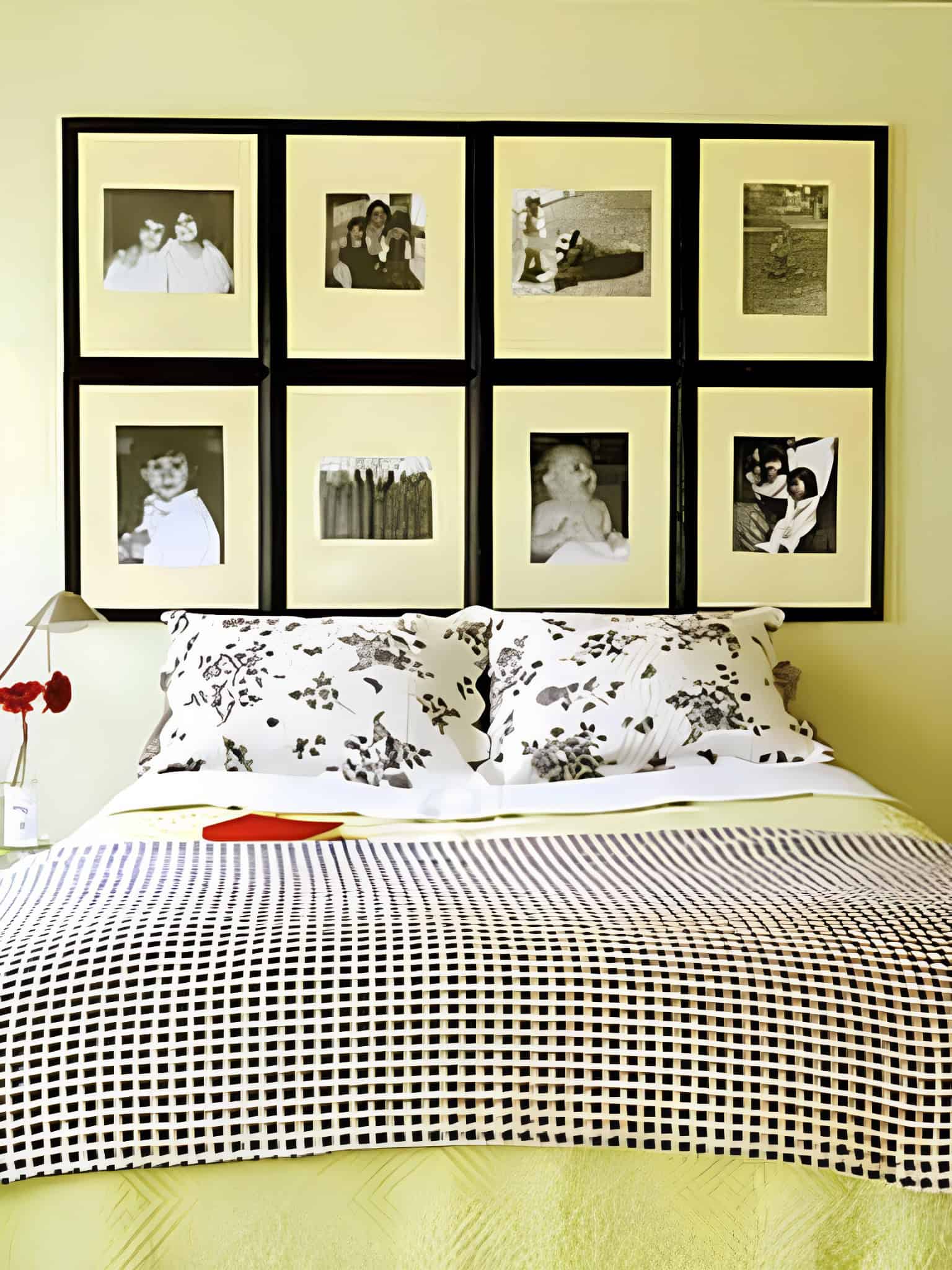 Gallery wall of family photos above a cozy bed with floral bedding