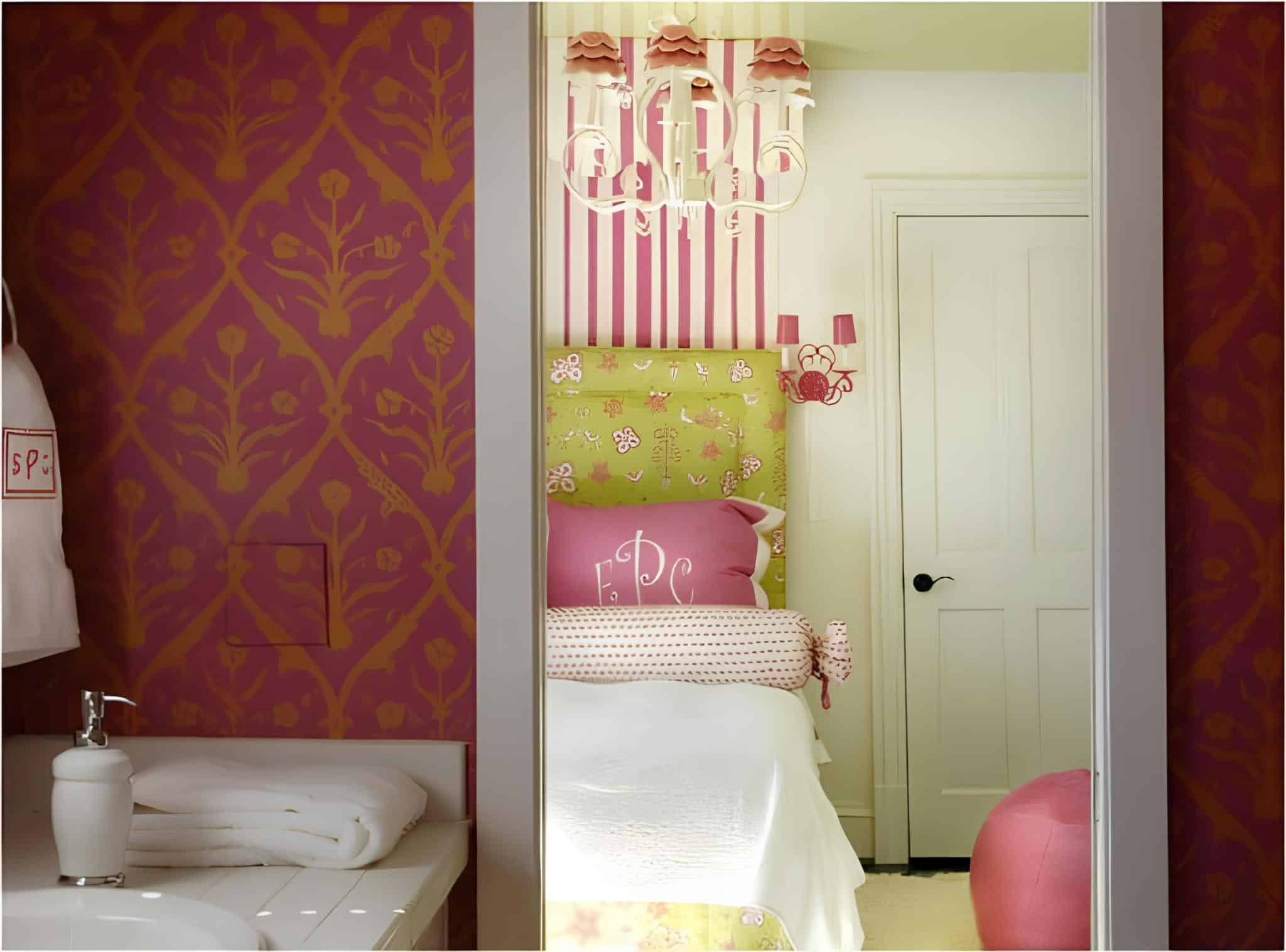 Elegant bedroom with striped pink wallpaper and green floral headboard