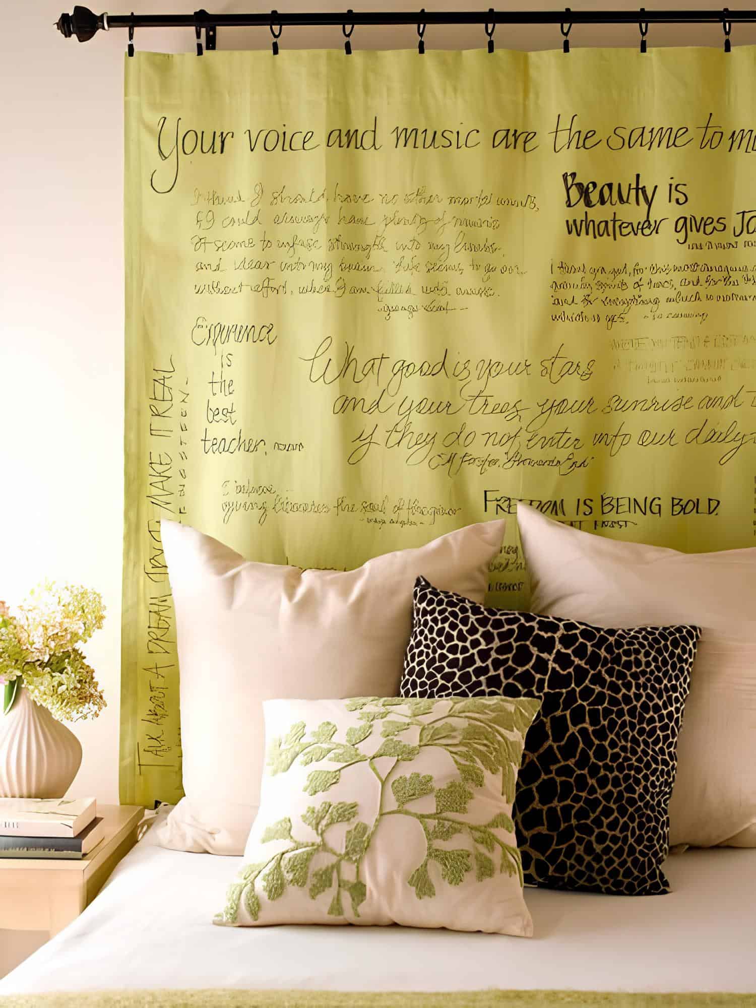 Headboard made of green fabric printed with inspirational quotes
