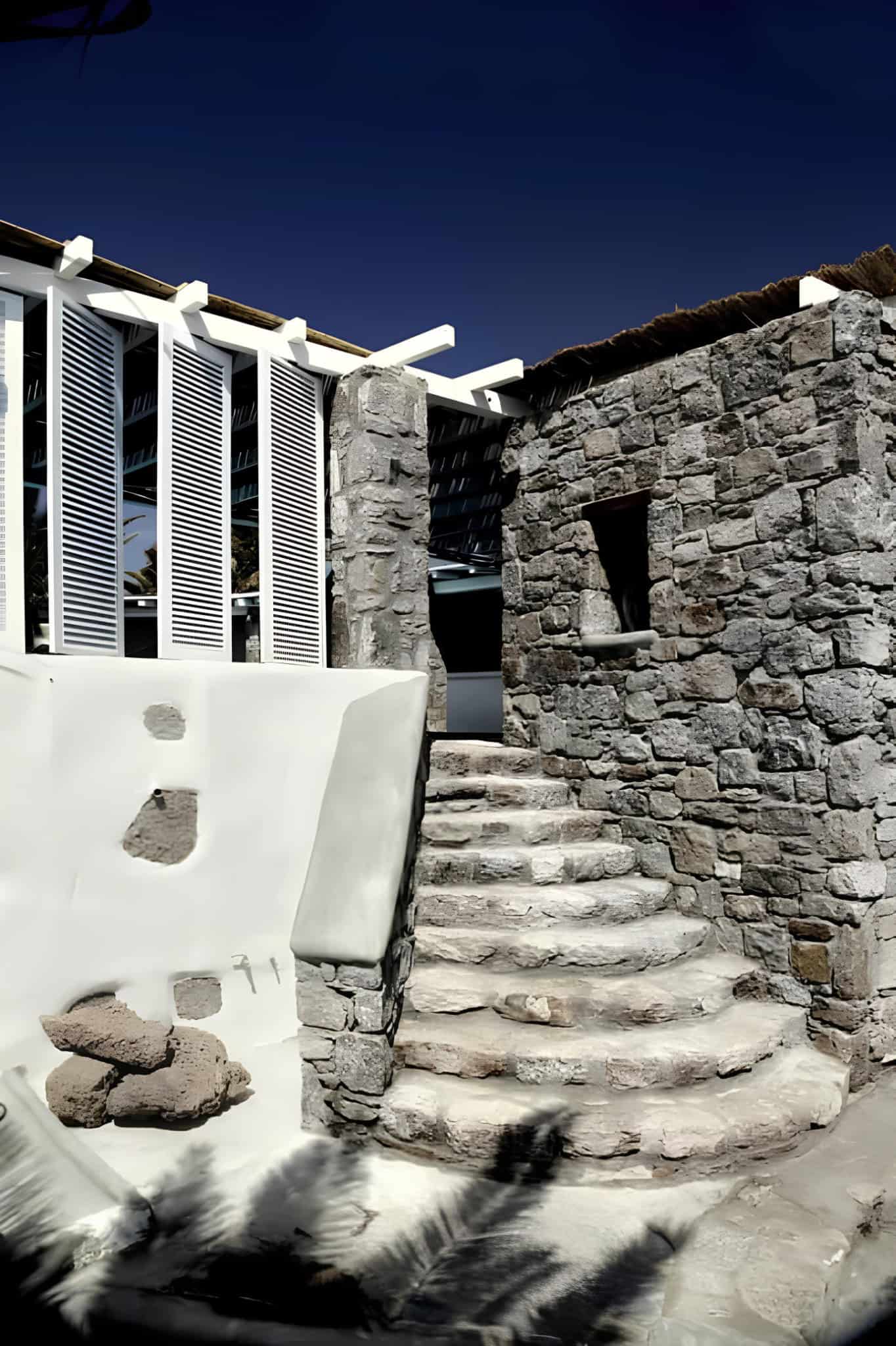 Stone Steps Cycladic Architecture Curved stone steps and rustic Cycladic architectural elements.
