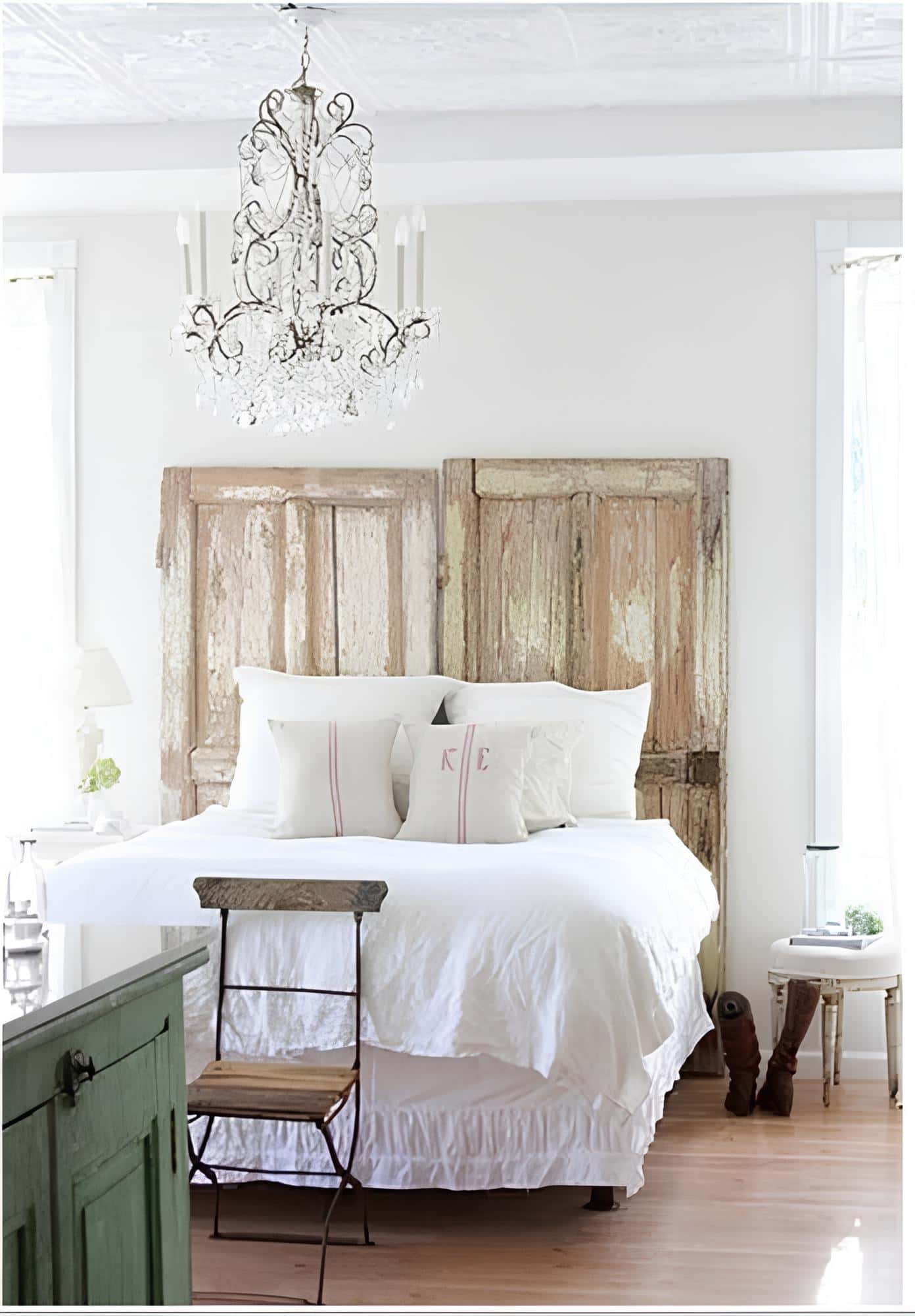 Shabby chic bedroom with repurposed doors as a headboard