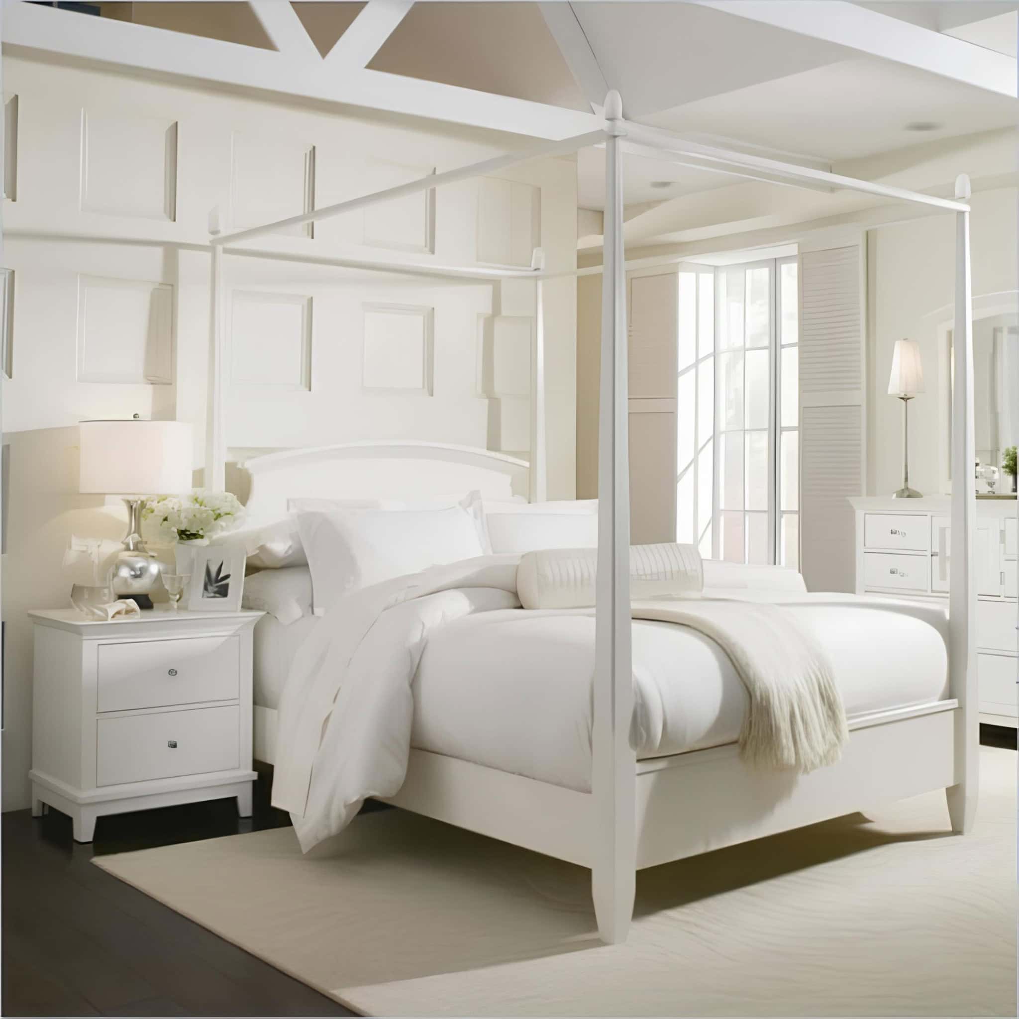 Classic White Bedroom with Four Poster Bed Elegant white four-poster bed in symmetrical classic room