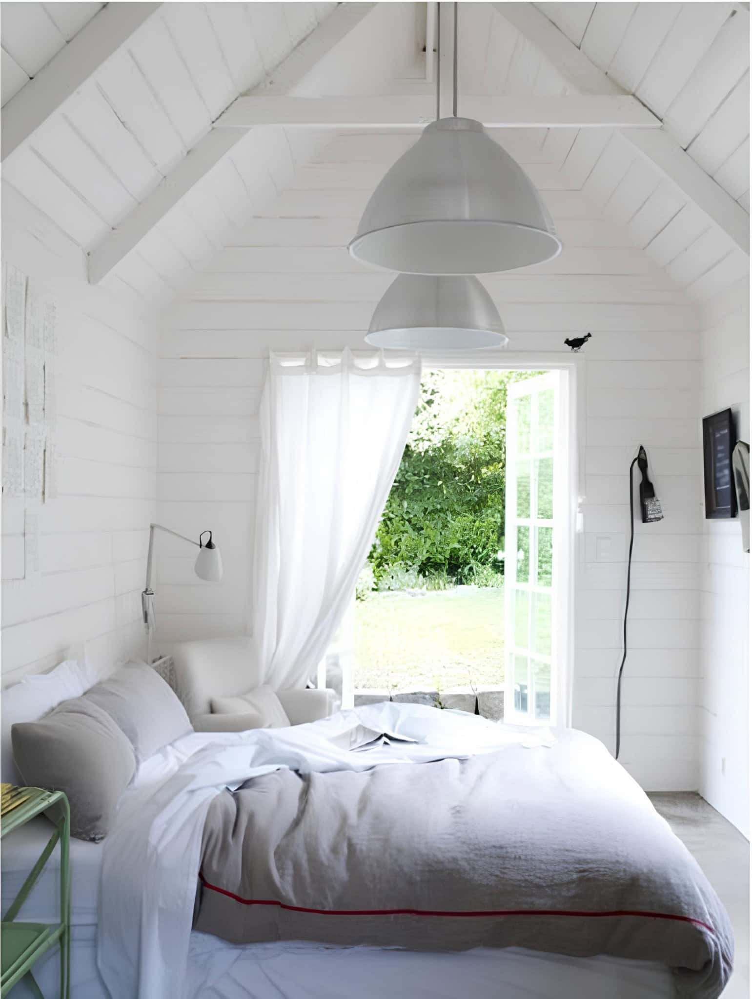 White Bedroom Cottage Style with Double Pendant Lights Cottage-style white bedroom with vaulted ceiling and pendant lights