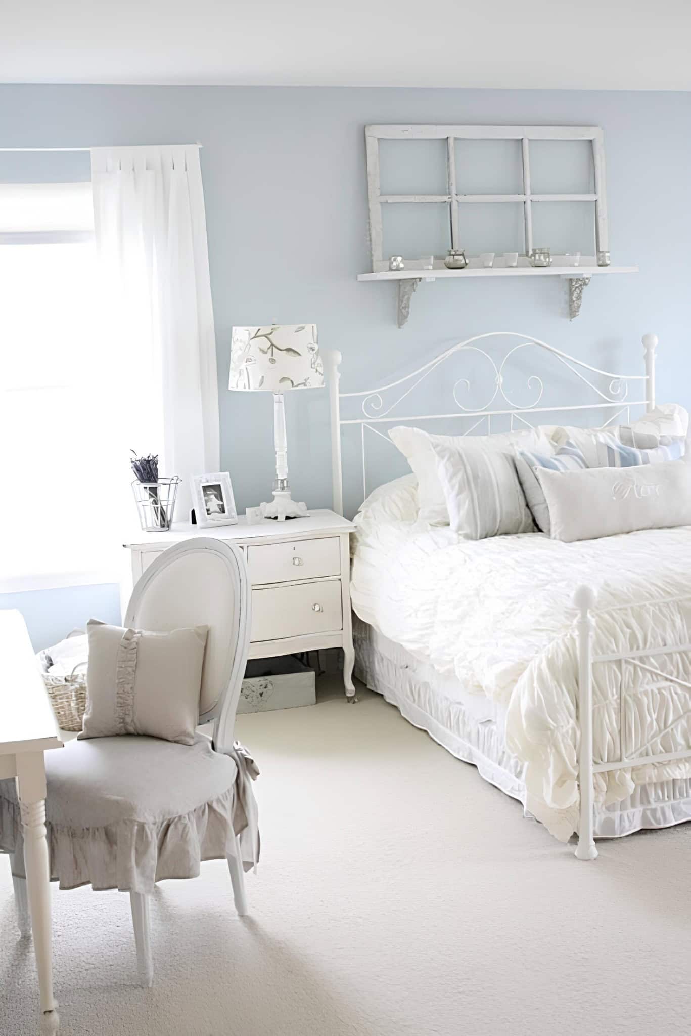White Bedroom with Blue Wall and Vintage Desk White bed with soft blue wall and classic decor elements