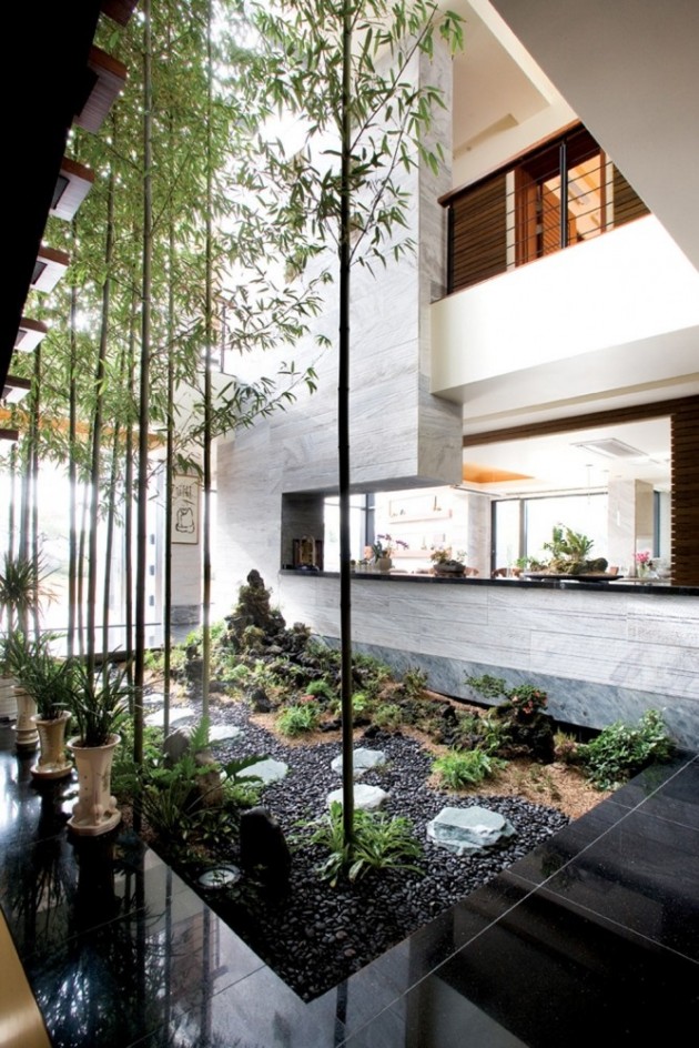 An Exotic Indoor Garden Surrounding a Zen Inspired Bath