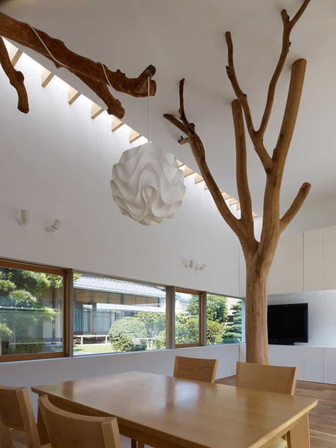 18 Incredible Houses with Trees in them 17
