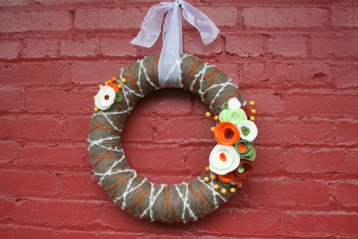 Handcrafted autumn wreath with rustic branches