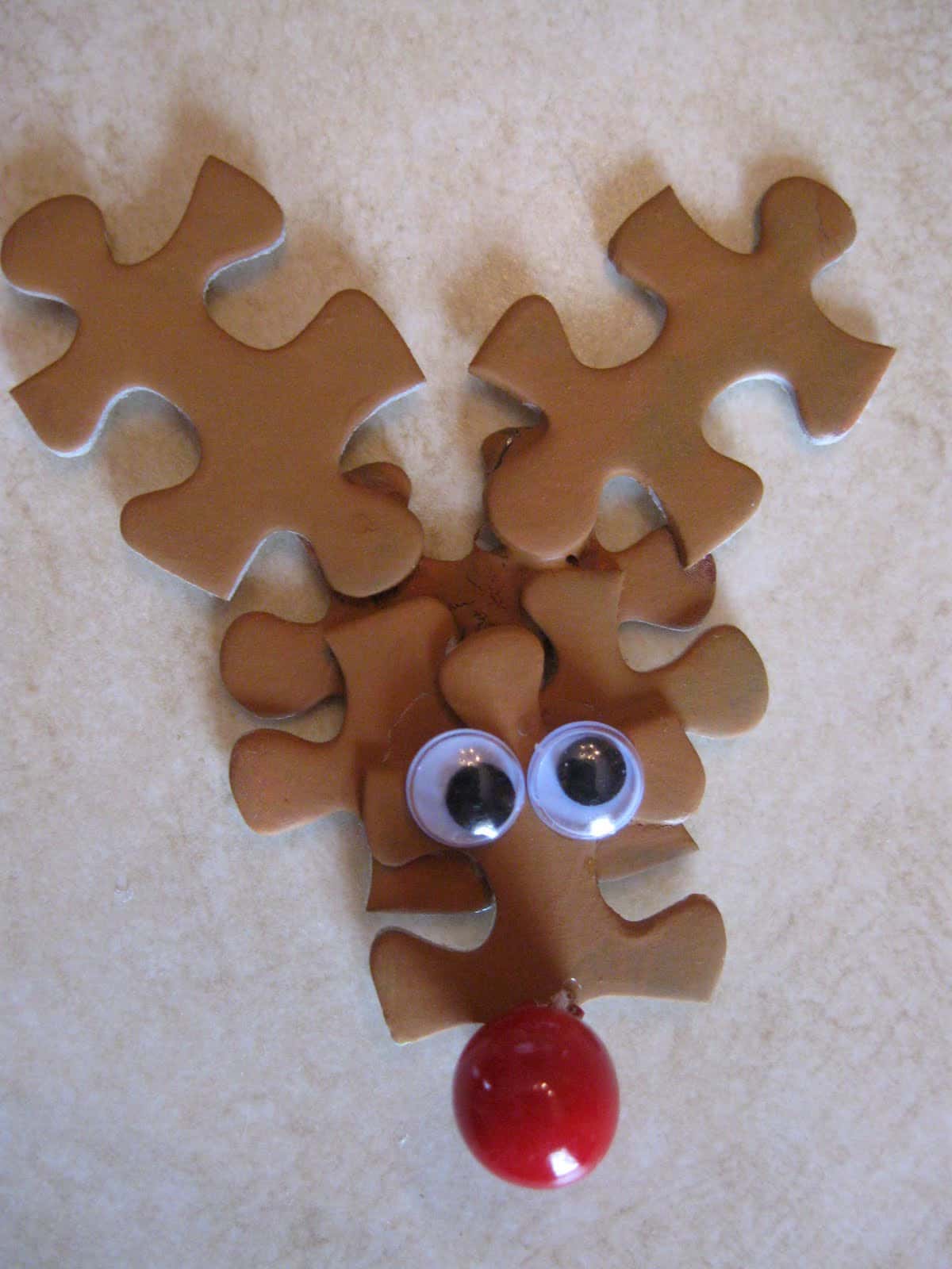 7. Interesting Rudolph made from old puzzle pieces. 11