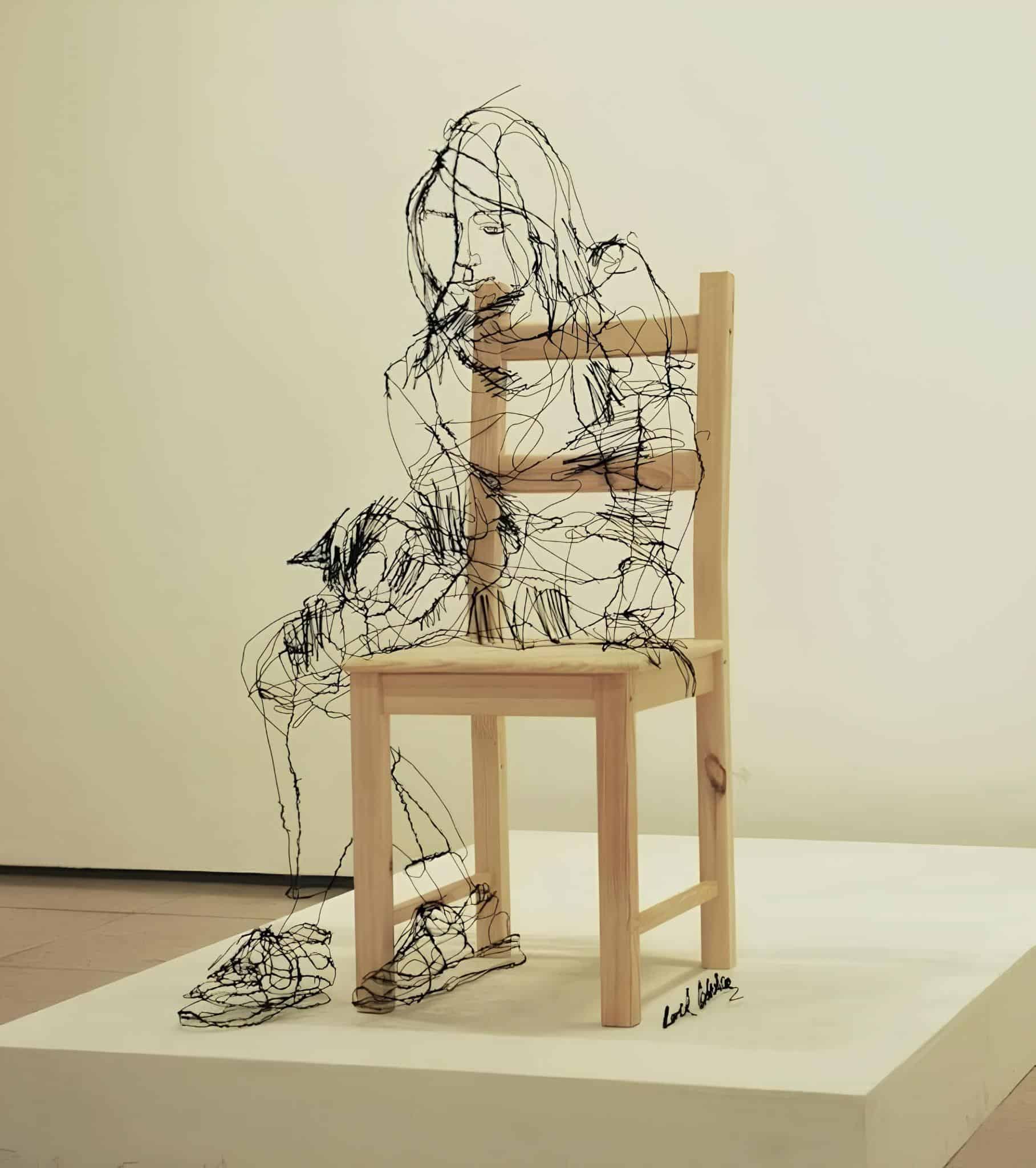 Girl Sitting On Chair Wire Sculpture