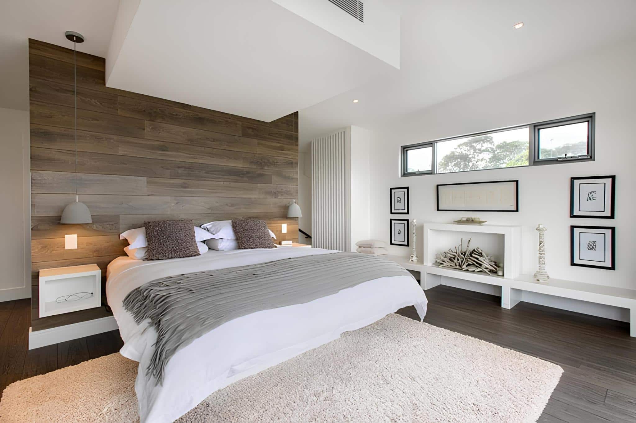 Modern bedroom with wood feature wall and minimalist decor