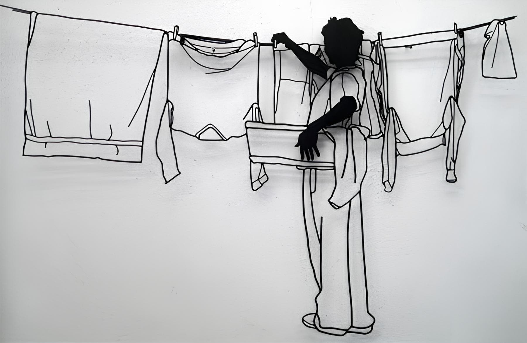 Wire Art Person Hanging Laundry On Clothesline