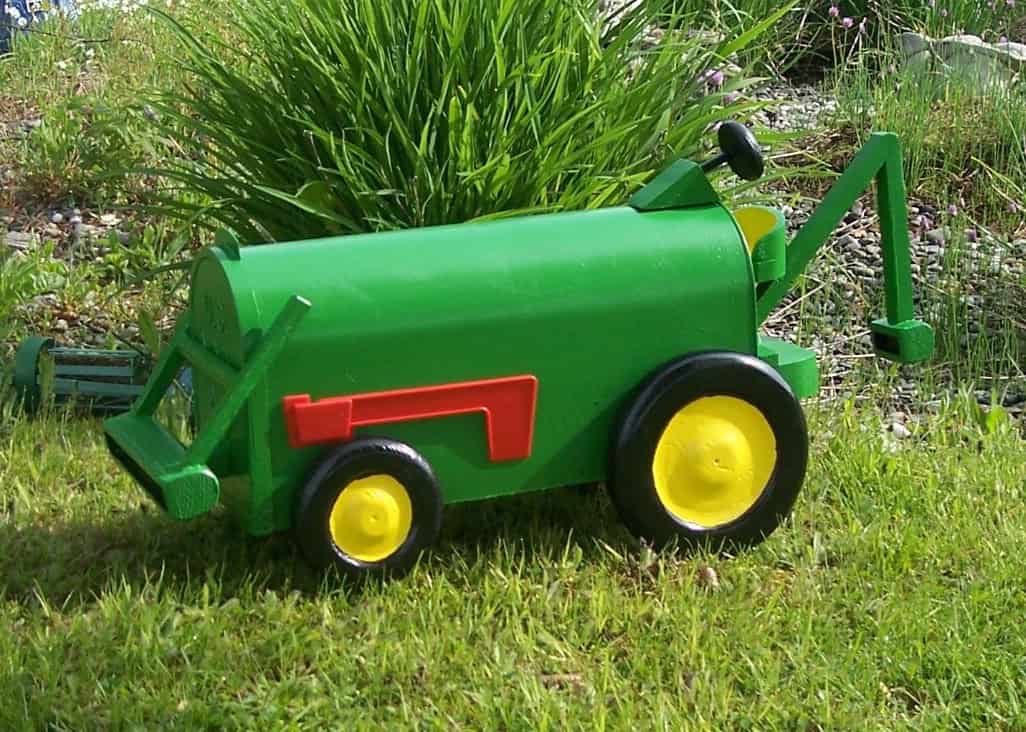 green bucket on tractor and backhoe mailbox 20 Beautiful Handmade Mailbox Designs (12)
