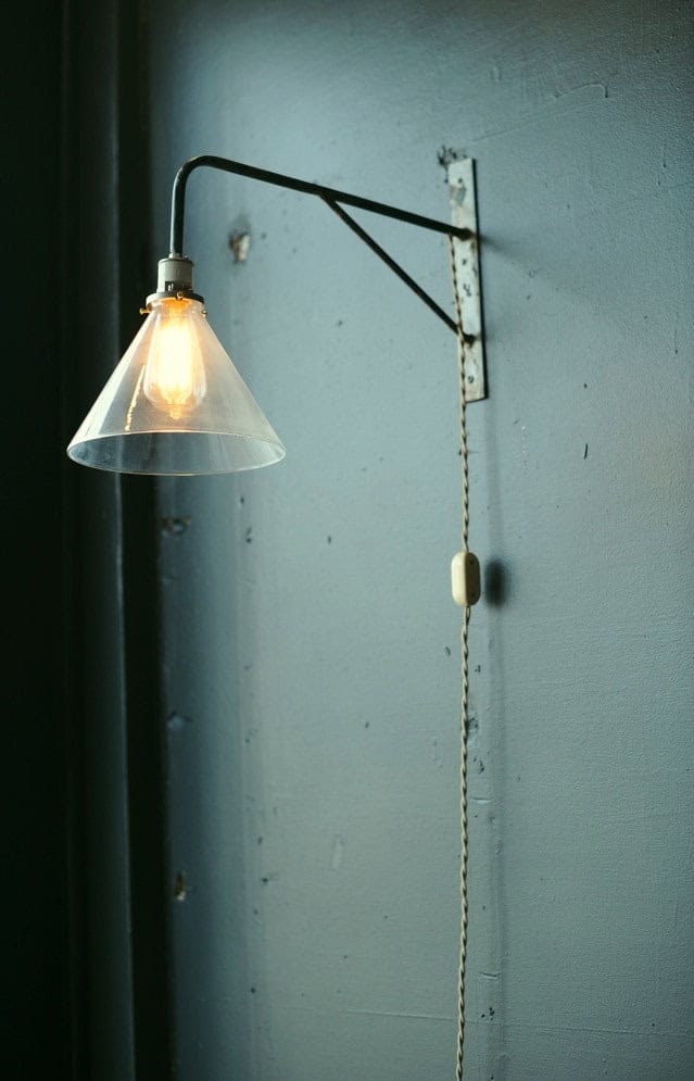 Industrial wall light with deep cone shade 20 Creative and Unique Lighting Designs (1)