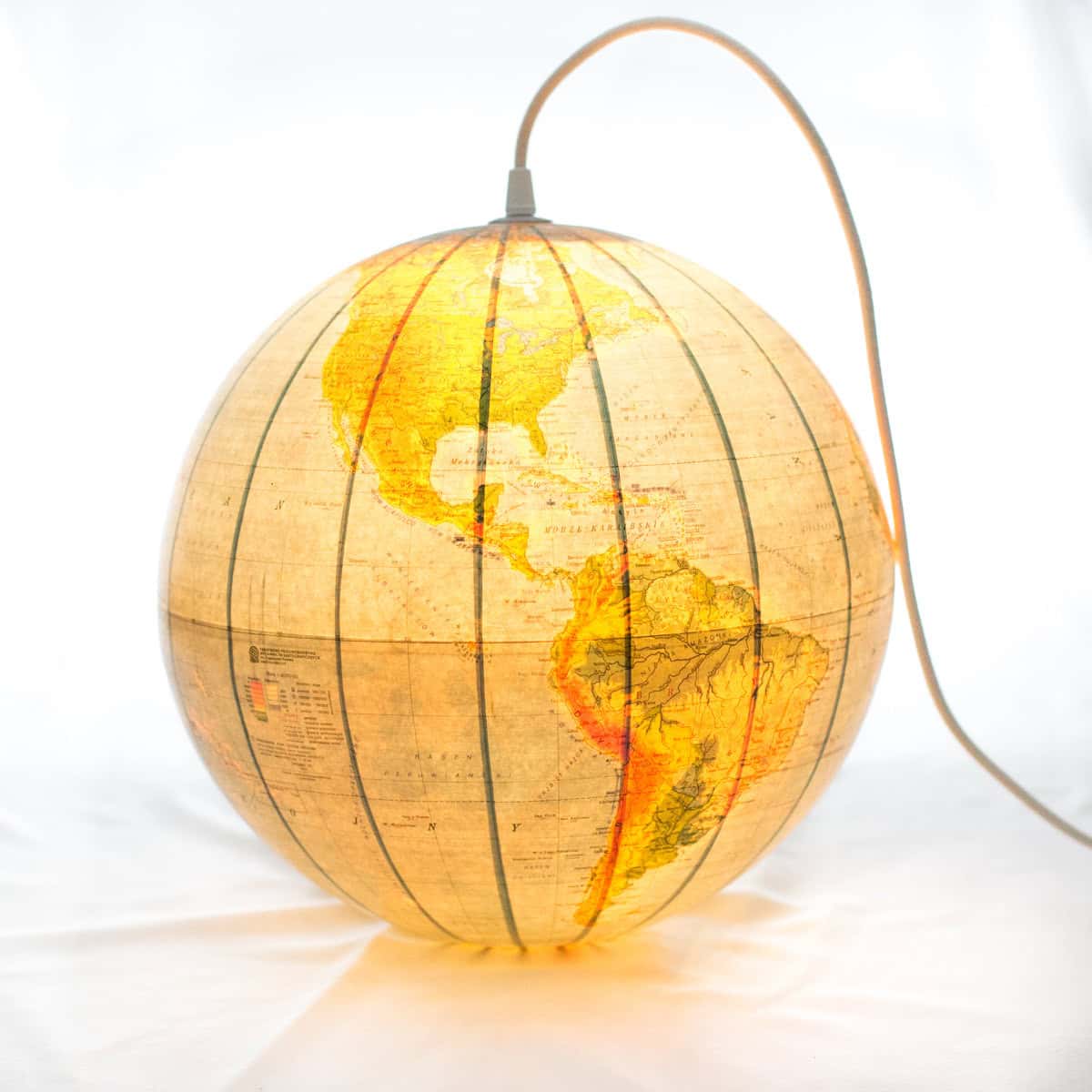 Lamp made of a vintage globe from the 1987 with cotton braided wire 20 Creative and Unique Lighting Designs (11)