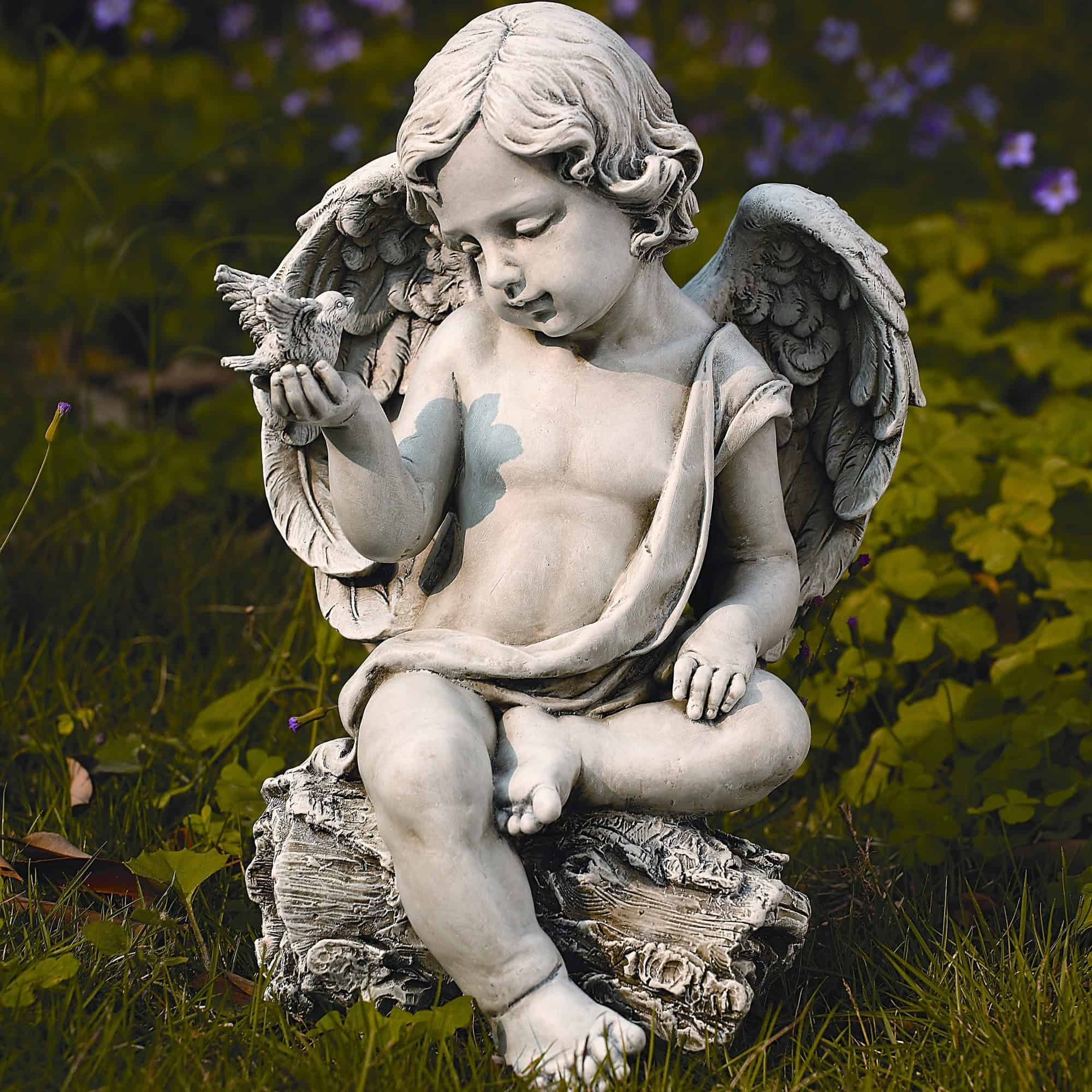 Cherub with Dove Statue 24 Diverse Garden Statue Decorations For This Spring (12)