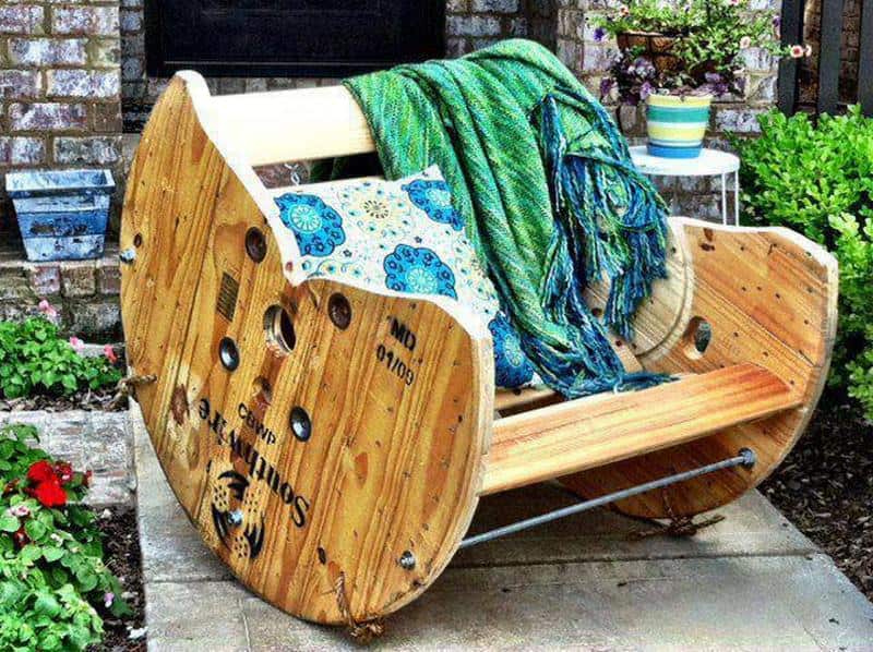 6. An old wooden cable reel can be turned into a comfy rocking chair for your backyard 6