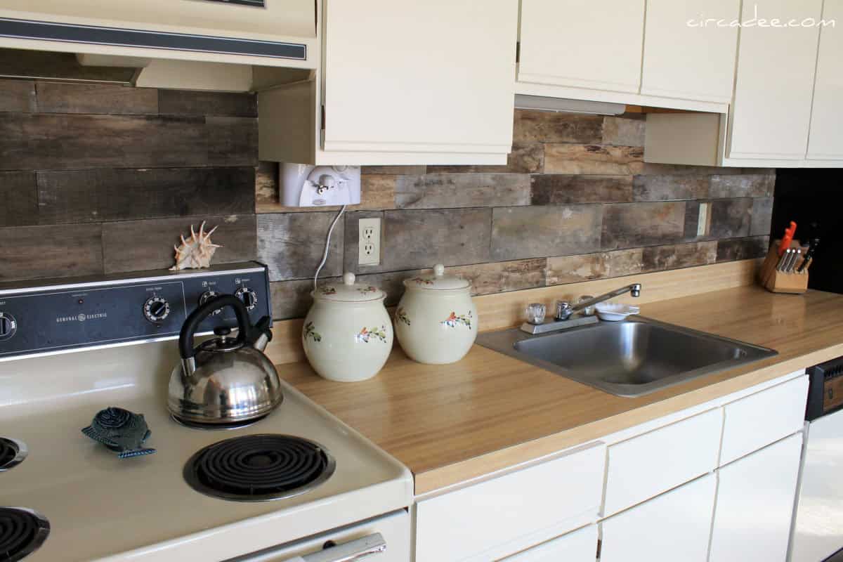 11. Recycle old pallets to craft this budget-friendly kitchen backsplash 10