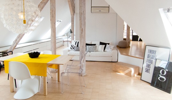 Cute attic apartment by Sabina Królikowska