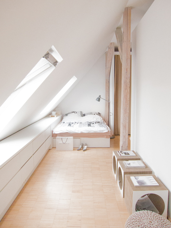 Cute attic apartment by Sabina Królikowska