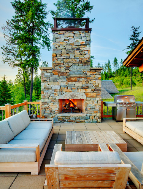 16 Relaxing Outdoor Fireplace Designs For Your Garden