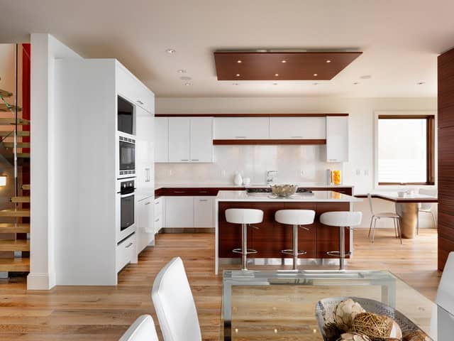 Contemporary Kitchen Design with warm colors and woods Source