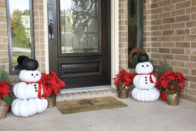 Reuse your leftover Halloween pumpkins to make snowmen Source