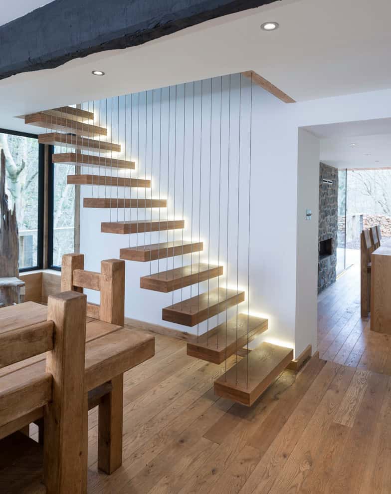 Modern floating staircase supplied by Heritage. Solid American White Oak was used to handcraft these beautiful stairs. Source