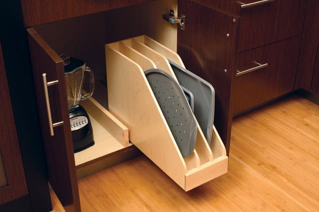 Cookie sheets and pizza pans occupy only a fraction of space when organized properly 13