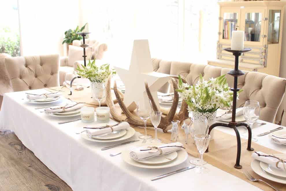 White, hessian and soft green table setting for Christmas Source