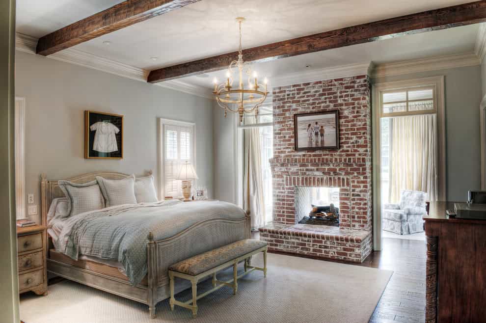 Beautiful master traditional bedroom with an adjacent sitting room Source