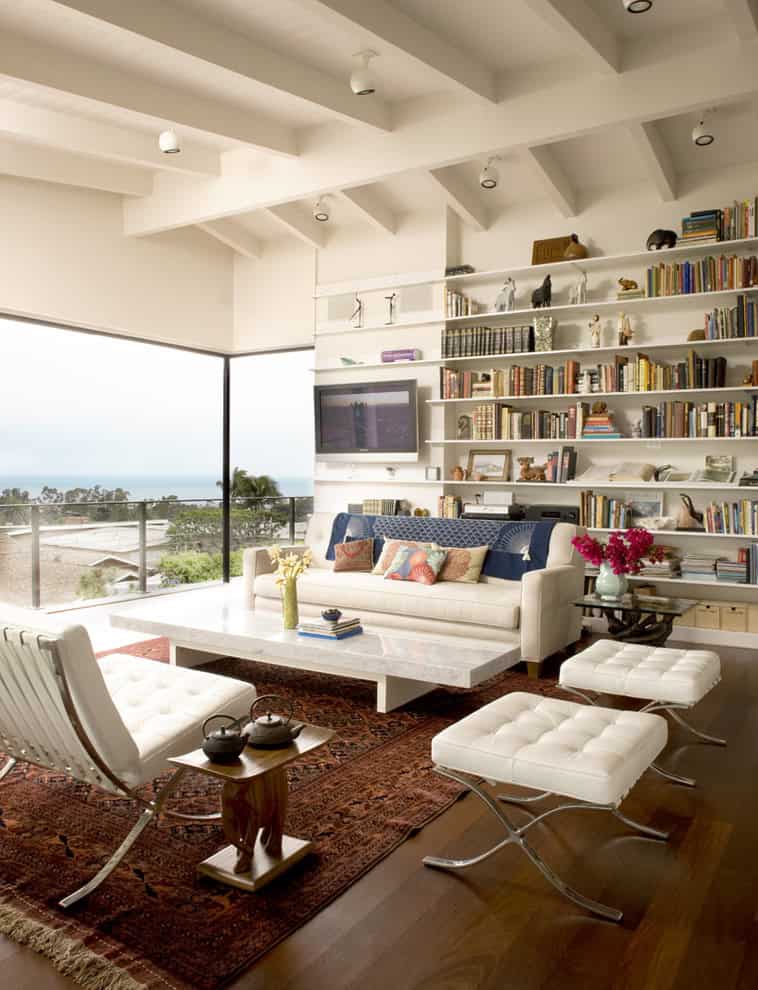Modern white mid-century living room Source