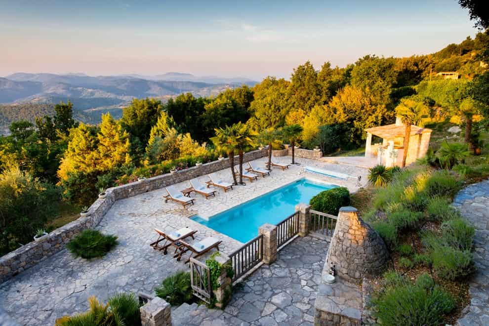 15 Splendid Rustic Swimming Pool Designs That Offer A Unique Experience