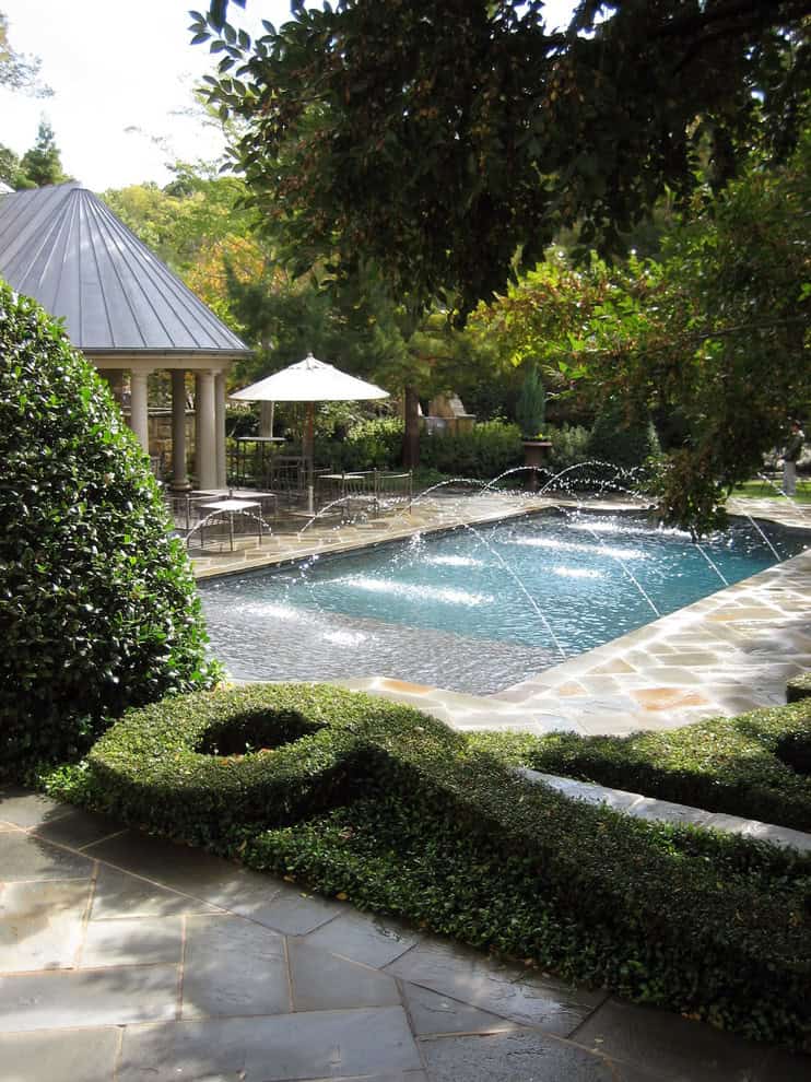 Elegant Traditional Swimming Pool and Landscaping Source