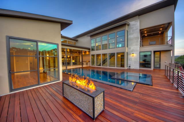 20 Sophisticated Outdoor Fire Pit Designs Near The Swimming Pool 10
