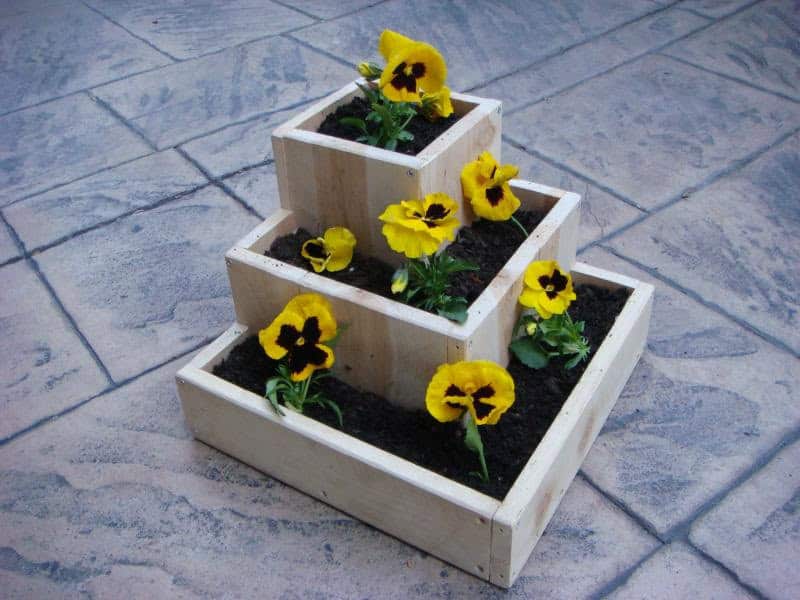 Lovely stacked wooden planter Source