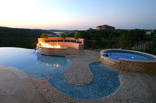 20 Sophisticated Outdoor Fire Pit Designs Near The Swimming Pool 16