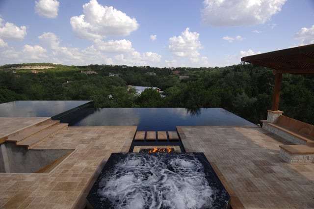 20 Sophisticated Outdoor Fire Pit Designs Near The Swimming Pool 6