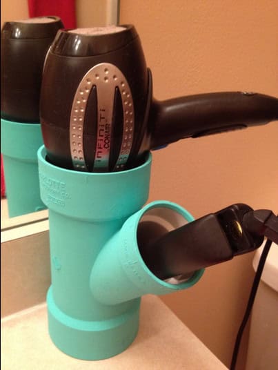 Keep the hair dryer and hair irons stowed neatly in mounted PVC pipe 7