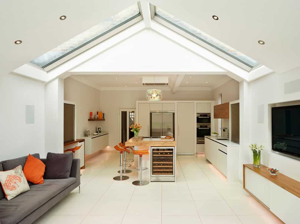 White bespoke kitchen Source