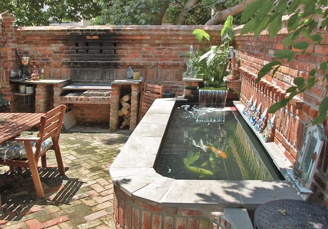 Attracitve Fish Pond In Your Backyard- 23 Impressive Ideas 20