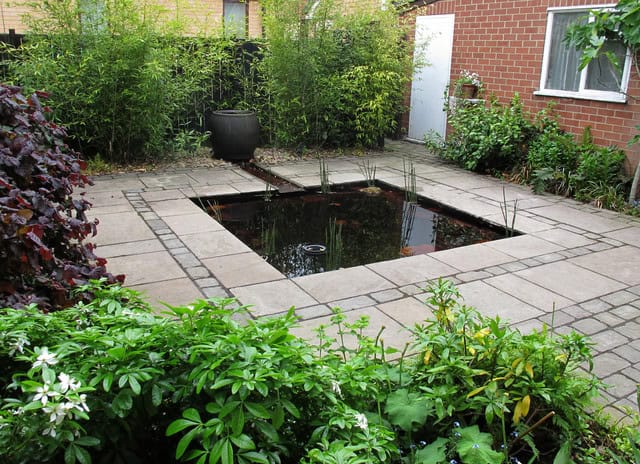 Attracitve Fish Pond In Your Backyard- 23 Impressive Ideas 21