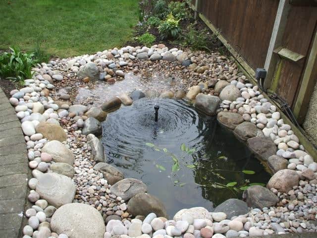 Attracitve Fish Pond In Your Backyard- 23 Impressive Ideas 22