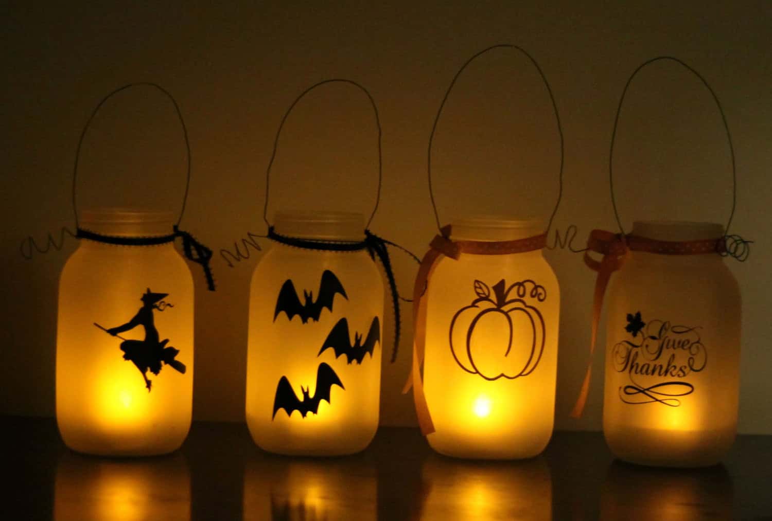 17 Scary Handmade Halloween Mason Jar Decorations With Lots of DIY Ideas