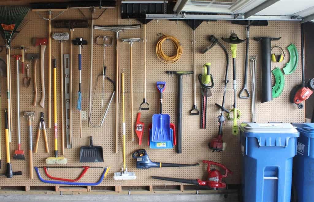 Put up peg boards and hang every piece of equipment and tool you own 1