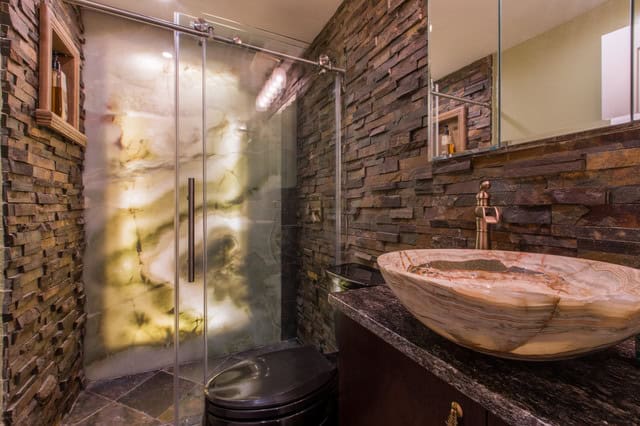 Stunning Bathroom with an Onyx Backlit Wall Source
